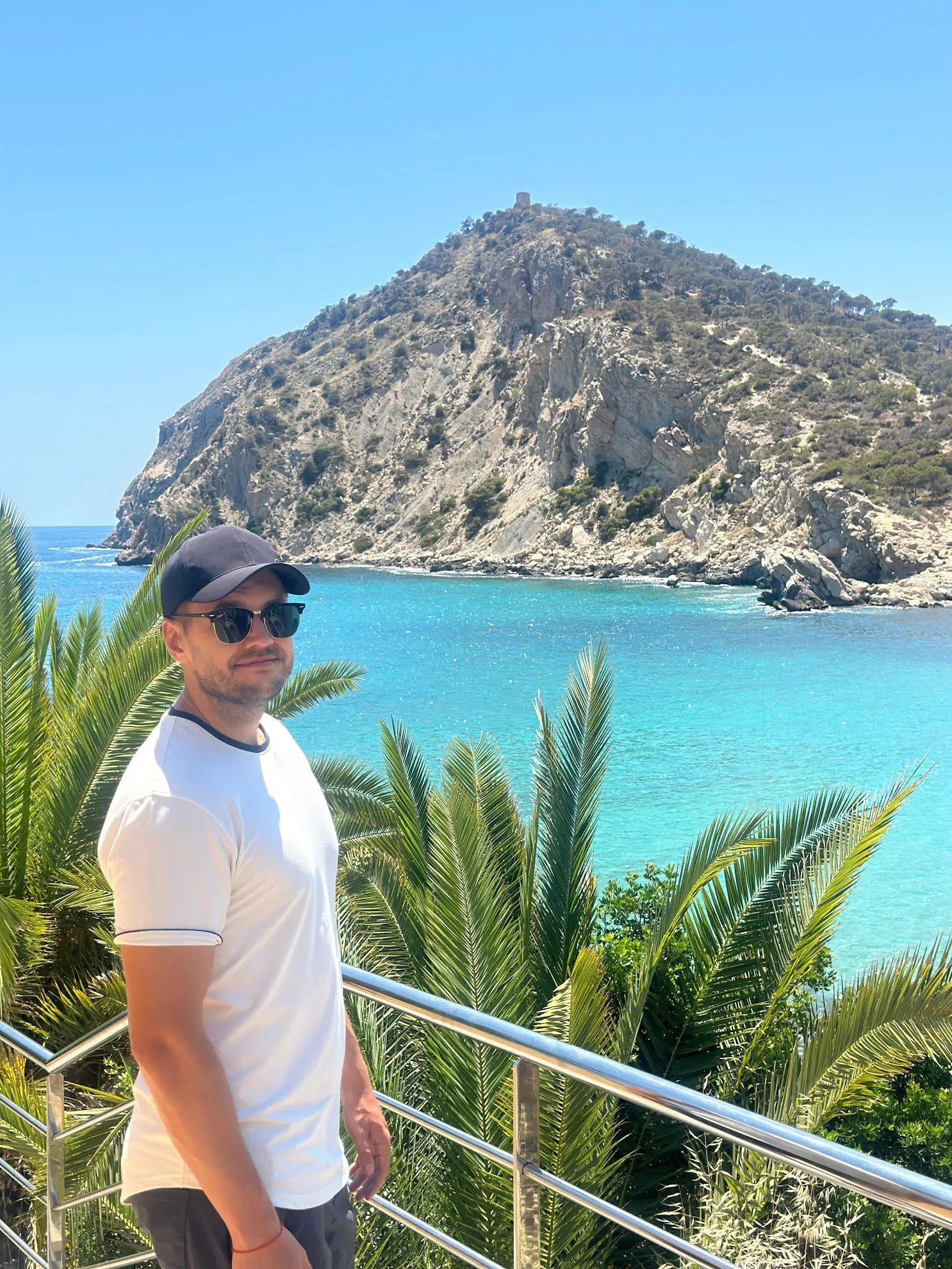 Standing in front of a beach in Finestrat, Spain